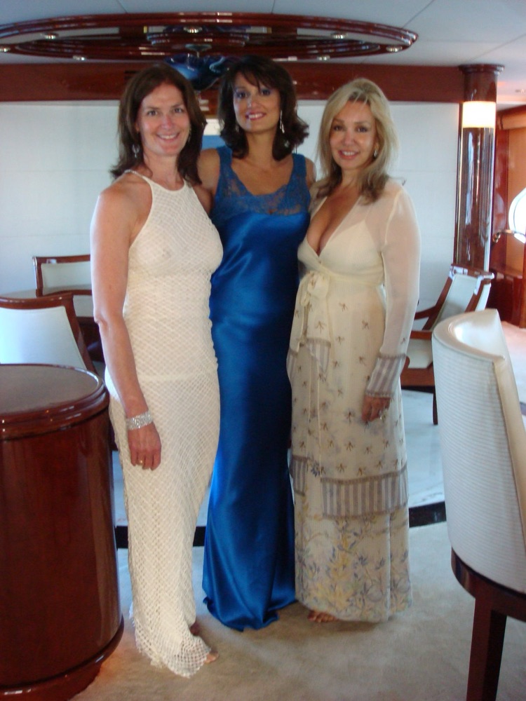 Sue Masterson, Afshan, and Jan Wallace (left to right) aboard a yacht